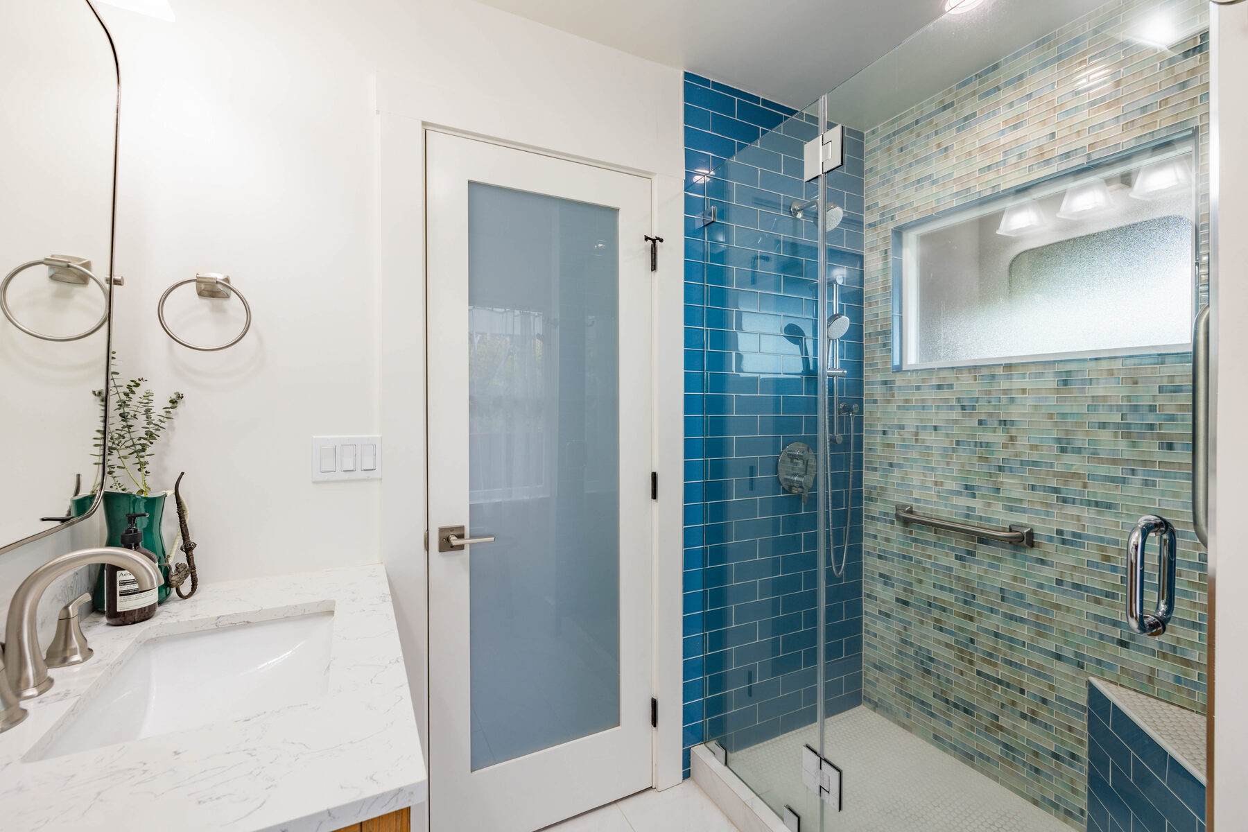 Bathroom with cobalt subway shower