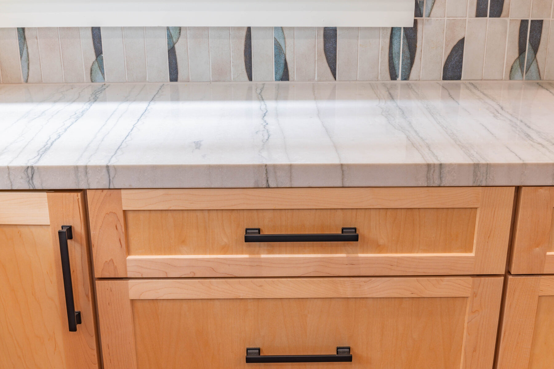 Quartzite counter and hand-set tile detail