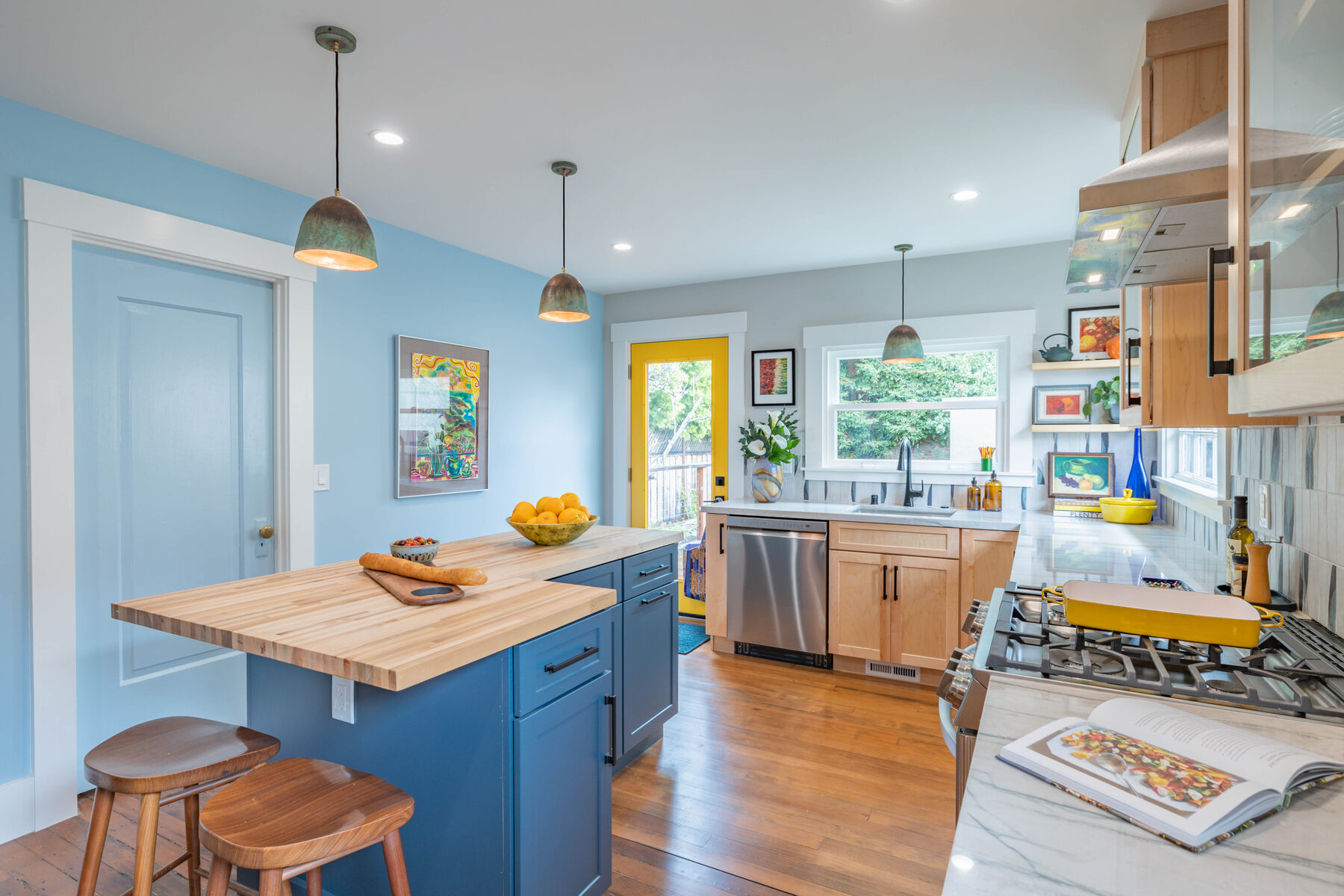 Acton Street kitchen with blue island and yellow door