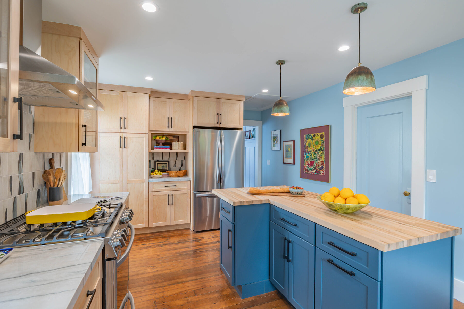 Full kitchen view with island and stove