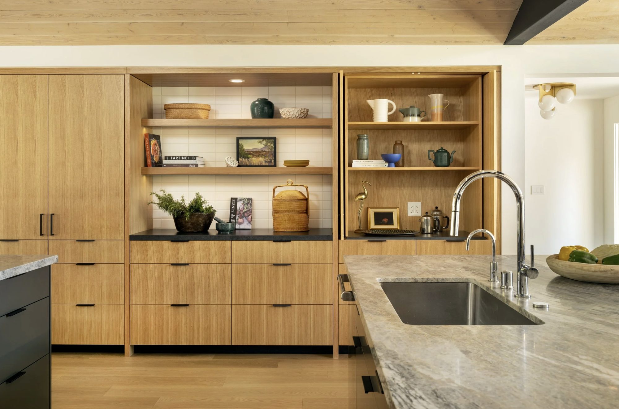 Magnolia Street white-oak kitchen with marble island