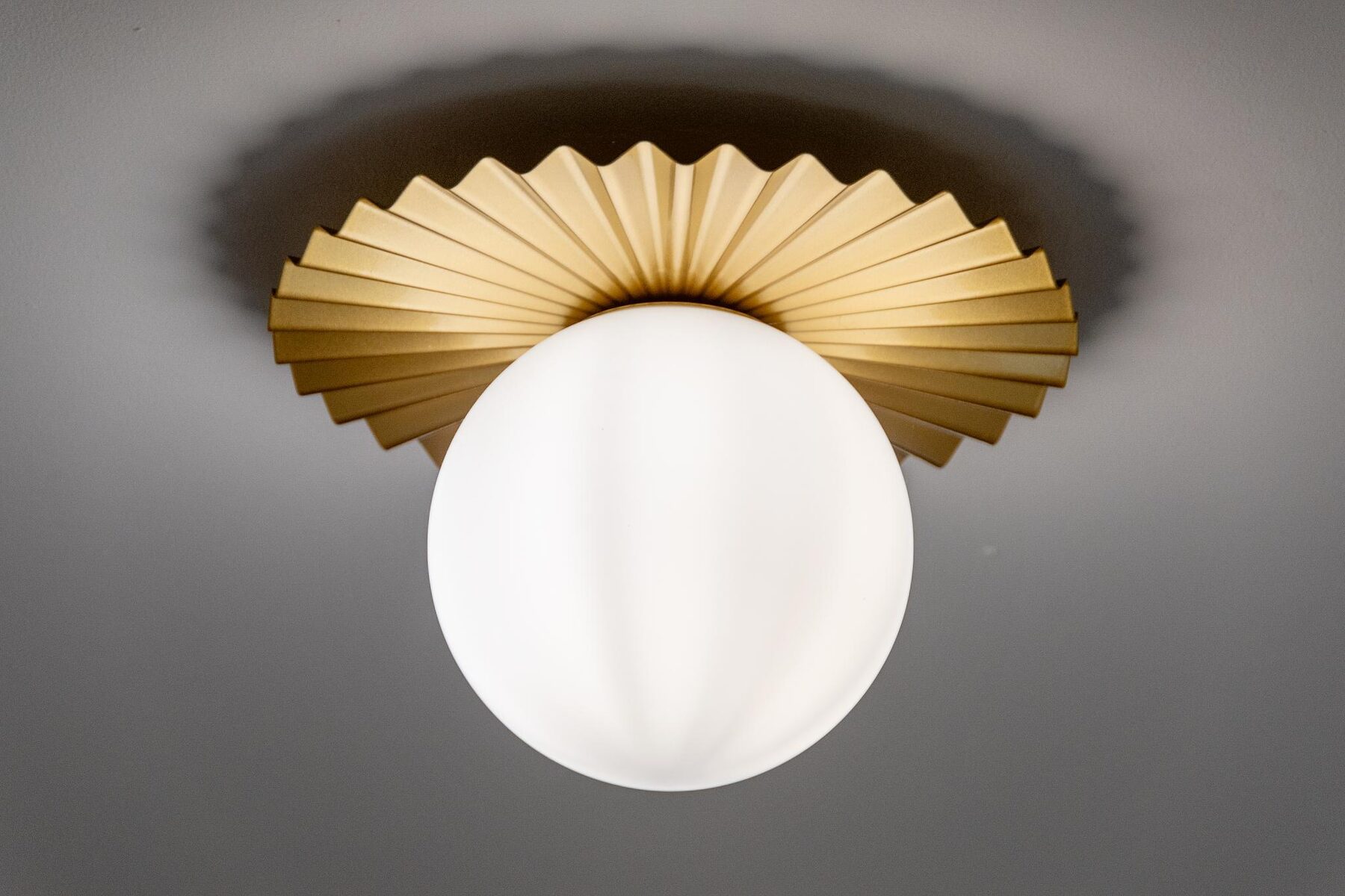 Custom brass ceiling sconce